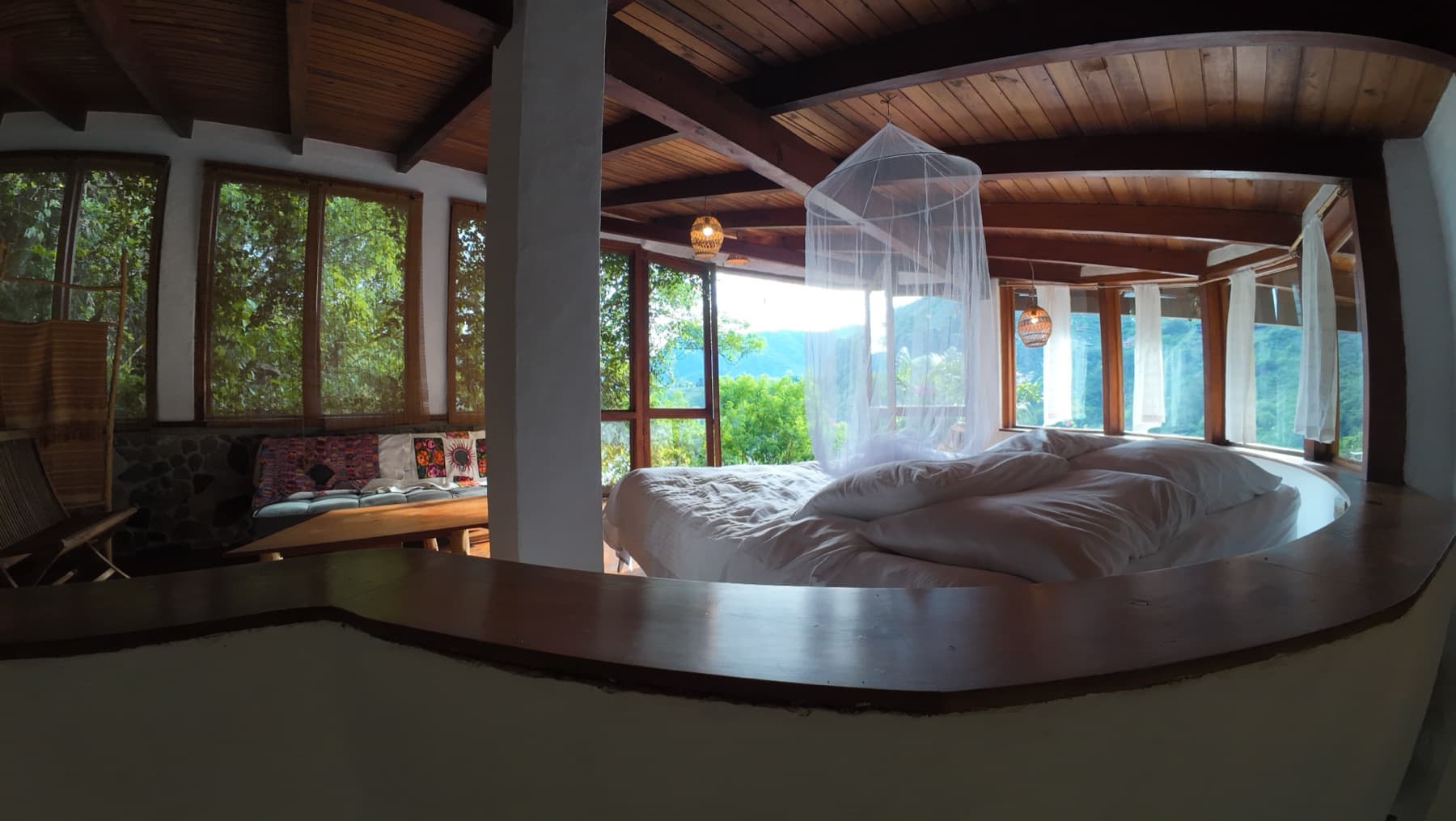 Round bed under a canopy net at Hill of Dreams
